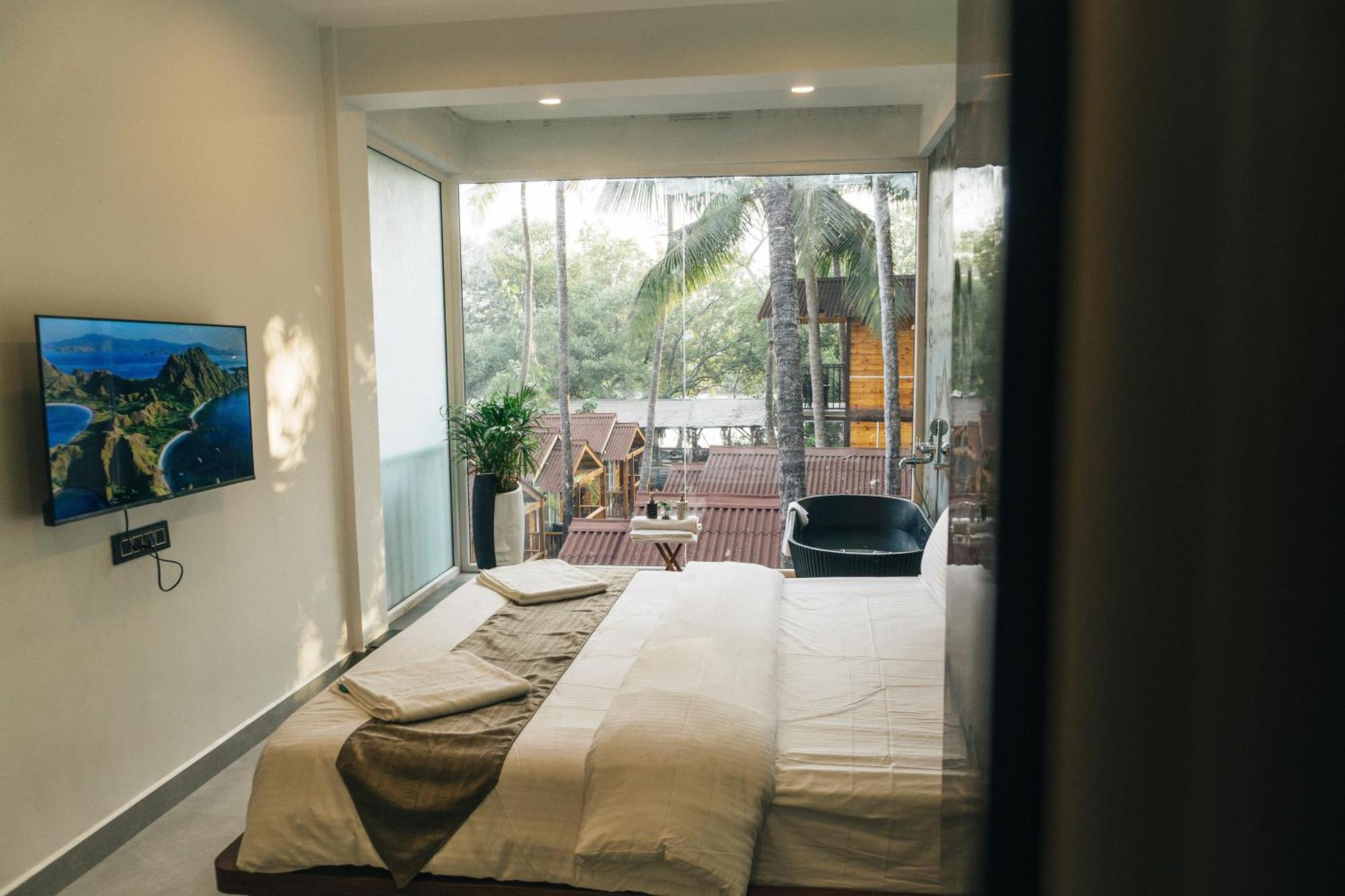 Tranquill Riverside Luxury Cottages With Bathtub, Candolim Bagian luar foto